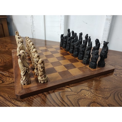 366 - A Chinese resin chess set