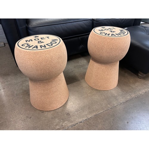 3015 - A pair of large champagne footstools