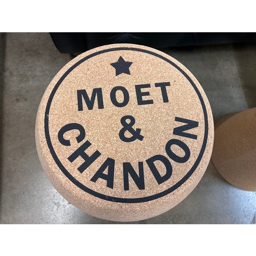 3015 - A pair of large champagne footstools