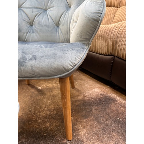 3083 - A Melade chair with footstool in aqua