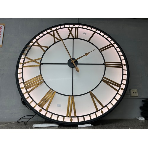 3136 - A large illuminated Westminster wall clock