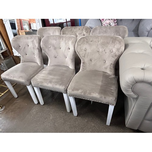 3123 - A set of six cream velvet button back dining chairs, two with damaged legs and one with a loose butt... 