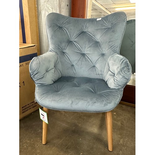 3164 - A Melade chair with footstool in aqua