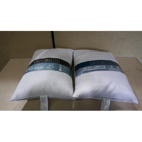 6025 - Hotel Grand Down Roll Pillow and a Summer/Winter Pillow (335-535) *This lot is subject to Vat