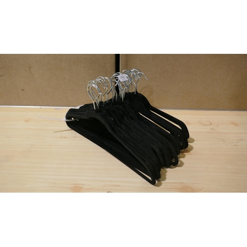 6139 - 30 Flocked Coat Hangers (335-802)  * This lot is subject to vat