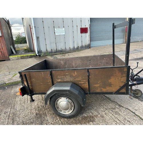 5297 - A metal framed wooden trailer with 1 tonne capacity - with handbrake 

 On view Friday 9.30-4.45pm a... 