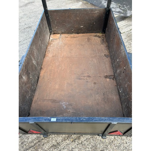 5297 - A metal framed wooden trailer with 1 tonne capacity - with handbrake 

 On view Friday 9.30-4.45pm a... 