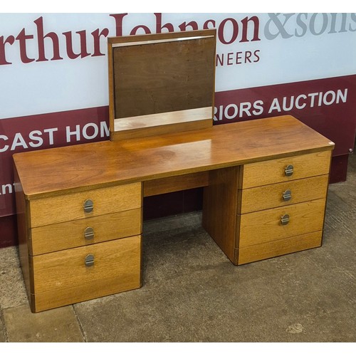 24 - A Stag Cantana teak dressing table, designed by John and Sylvia Reid