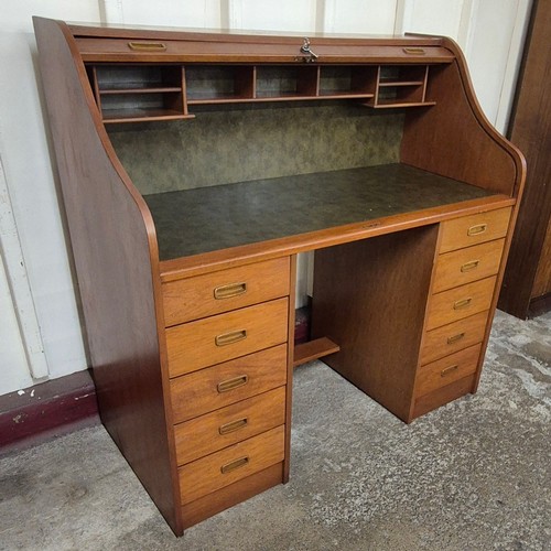 32 - A Danish teak tambour roll top desk