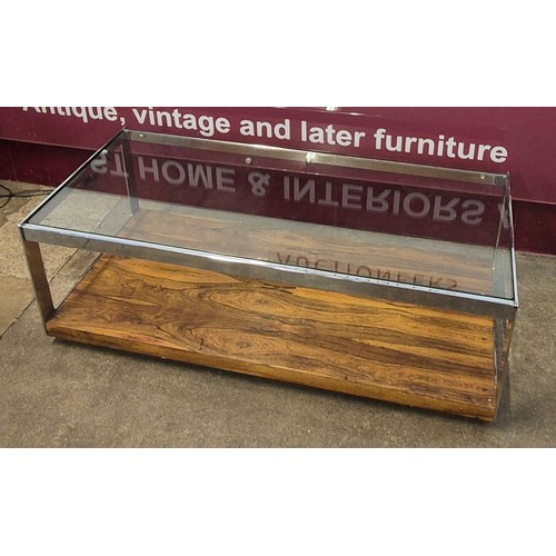 39 - A Merrow Associates rosewood, chrome and glass topped rectangular table, designed by Richard Young. ... 