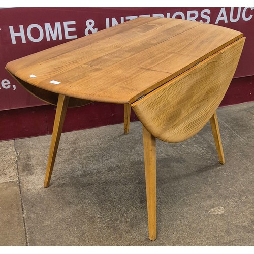 44 - An Ercol Blonde elm and beech Windsor drop-leaf table