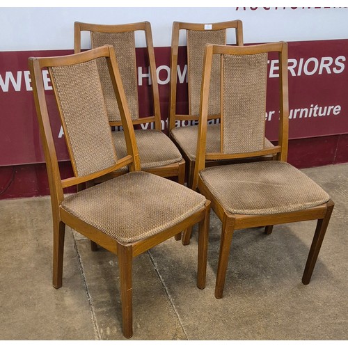 57 - A set of four Nathan teak dining chairs