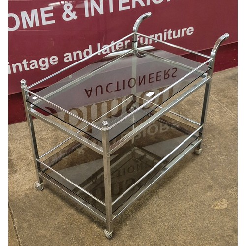 60 - An Italian style chrome and smoked glass cocktail trolley