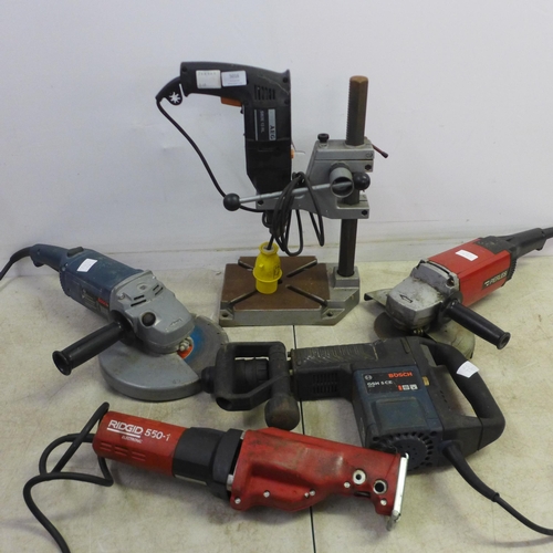 5016 - A quantity of power tools including an AEG SBZA 12RL power drill with a Wolfcraft drill press, a Bos... 