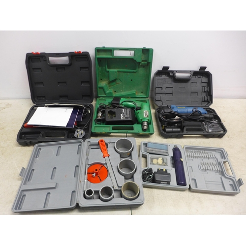 5024A - A quantity of cased tools including a power base 672936 multi-tool with accessories, a Hitachi DTC-1... 