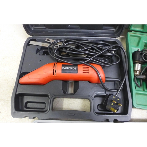 5024A - A quantity of cased tools including a power base 672936 multi-tool with accessories, a Hitachi DTC-1... 