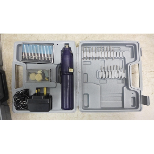 5024A - A quantity of cased tools including a power base 672936 multi-tool with accessories, a Hitachi DTC-1... 