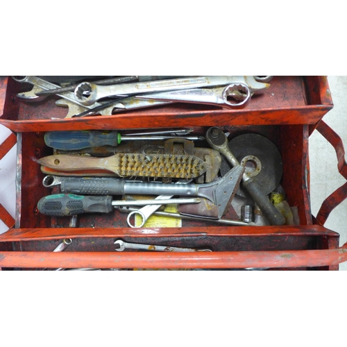 5027 - A red metal cantilever tool box with assorted tools including sockets, wrenches, screwdrivers, etc