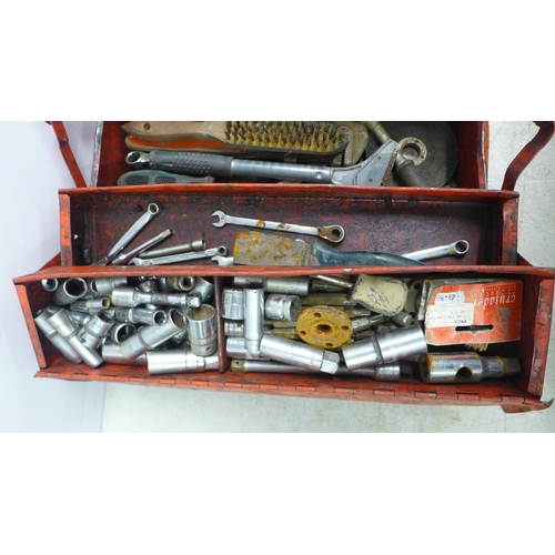 5027 - A red metal cantilever tool box with assorted tools including sockets, wrenches, screwdrivers, etc