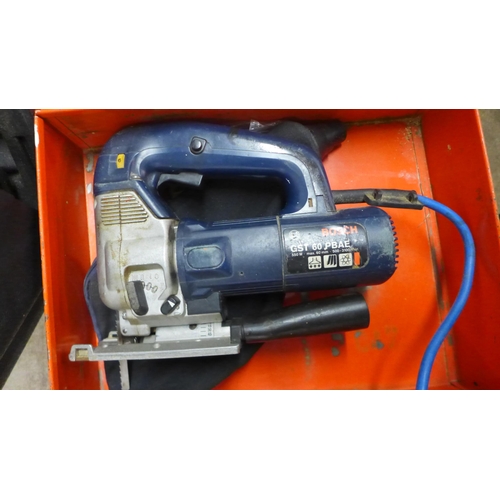 5030 - A JCB D-C5 230V, circular saw, a Bosch G-ST 60 PBAF jigsaw and a Black and Decker HG 991 heat gun