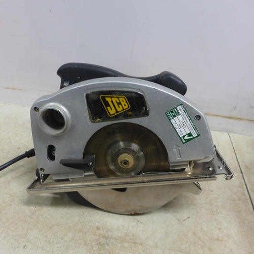 5030 - A JCB D-C5 230V, circular saw, a Bosch G-ST 60 PBAF jigsaw and a Black and Decker HG 991 heat gun