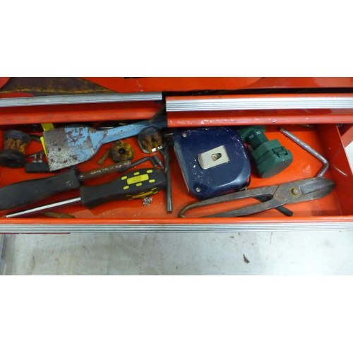 5035 - A large red metal Challenge tool box containing assorted hand tools and other items, a 16