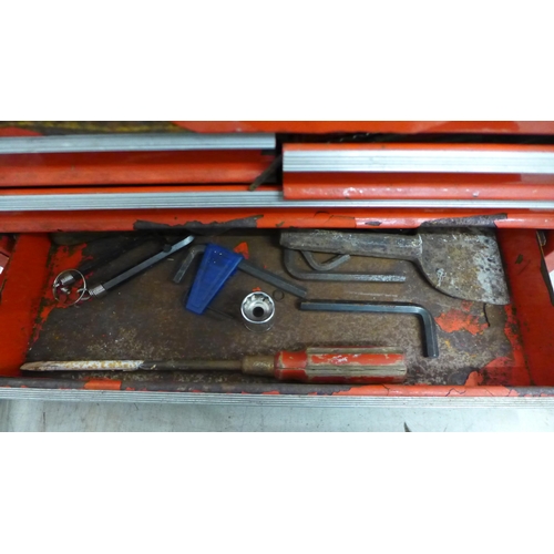 5035 - A large red metal Challenge tool box containing assorted hand tools and other items, a 16