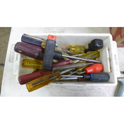 5037 - A box of assorted hand tools with a box of plumbing supplies including a mixer tap, flexible tap hos... 