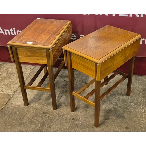 50R - A pair of teak single drawer drop-leaf side tables