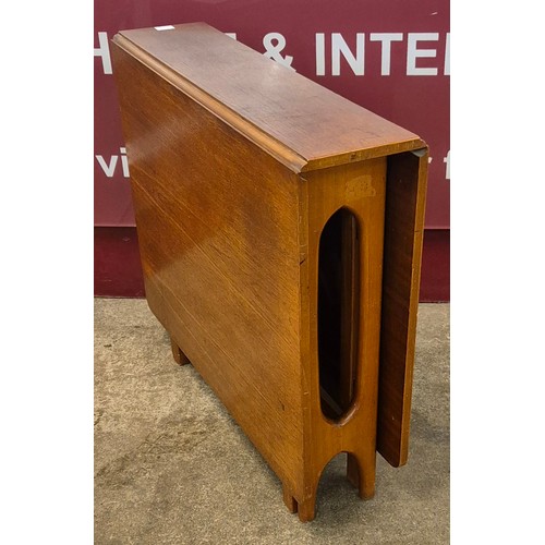 50P - A McIntosh teak drop-leaf table