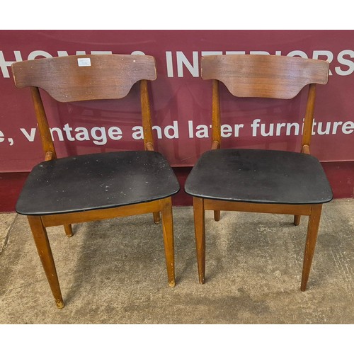 50N - A pair of teak dining chairs