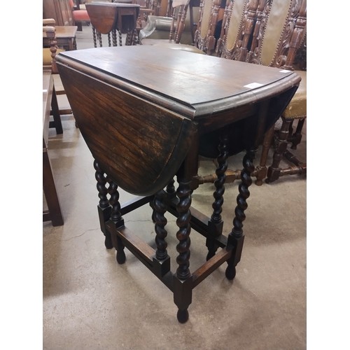 191 - An early 20th Century oak barleytwist gateleg table