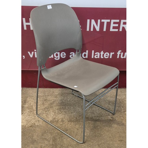 82 - A set of six Herman Miller grey plastic & tubular metal Limerick stacking chairs