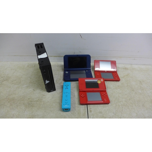 5053 - A quantity of Nintendo gaming equipment including two Nintendo DS lite handheld consoles, a Nintendo... 