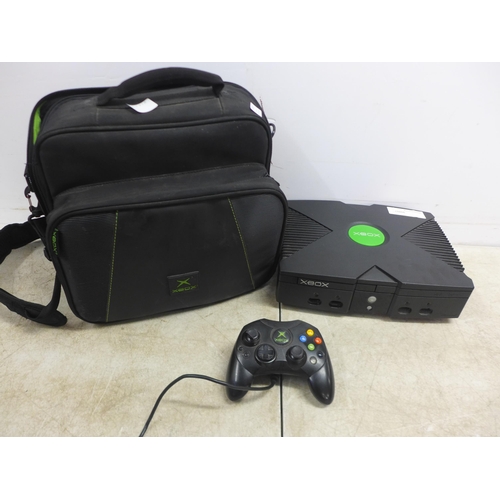 5055 - An original Xbox, an original Xbox controller, power lead and Xbox travel case