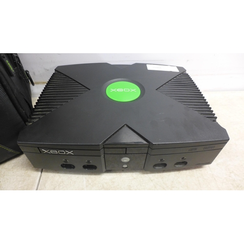 5055 - An original Xbox, an original Xbox controller, power lead and Xbox travel case