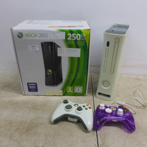 5056 - A boxed 250GB XBox 360S console with wireless controller and power supply and one other XBox 360 con... 