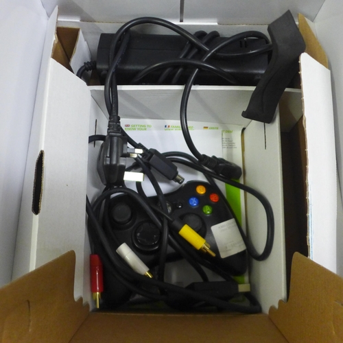 5056 - A boxed 250GB XBox 360S console with wireless controller and power supply and one other XBox 360 con... 