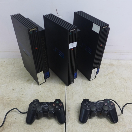 5058 - Three Playstation 2 consoles with two PlayStation controllers and two sets of power cables and AV ca... 