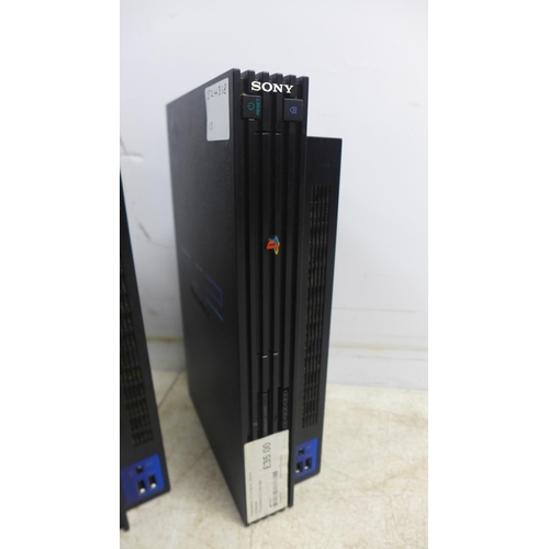 5058 - Three Playstation 2 consoles with two PlayStation controllers and two sets of power cables and AV ca... 