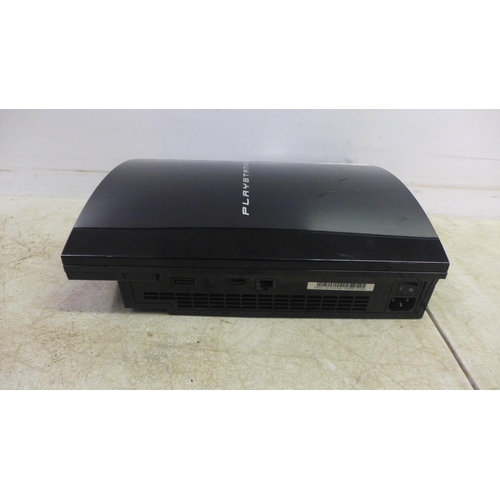 5060 - A Sony Playstation 3 (model: CECHK03) console and a Sony Playstation 2 (silver edition) with assorte... 