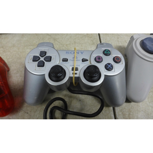 5060 - A Sony Playstation 3 (model: CECHK03) console and a Sony Playstation 2 (silver edition) with assorte... 