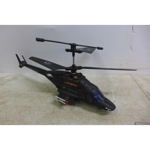 5063 - A collection of remote controlled vehicles including a Lie-Bro 8019 figures copter,a Condor petrol p... 