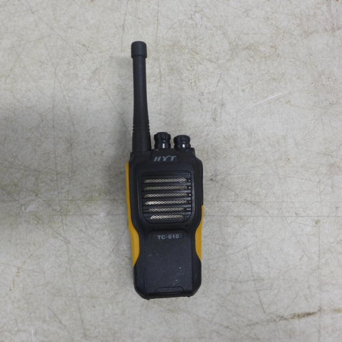 5071 - A set of six Hytera HYT TC-610 two way walkie-talkie radios, two spare batteries and a HYT 6-unit ch... 