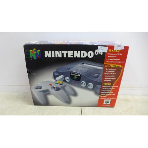 5079 - A boxed Nintendo 64 games console with Nintendo 64 controller pad, power cable, user manuals and two... 