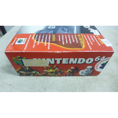 5079 - A boxed Nintendo 64 games console with Nintendo 64 controller pad, power cable, user manuals and two... 