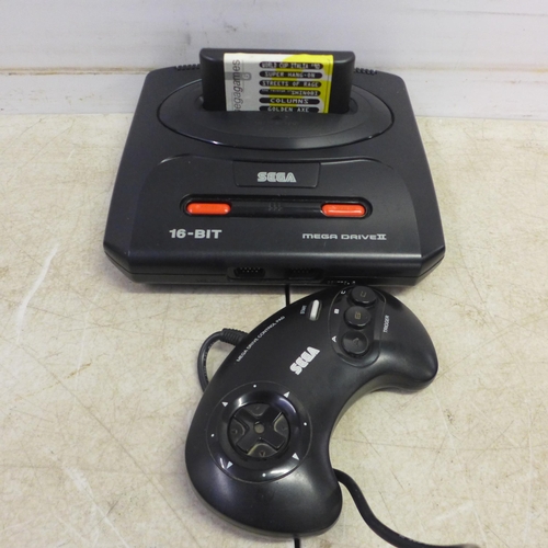 5080 - A Sega Mega Drive II 16-bit games console with a six game Mega Games cartridge including World Cup I... 