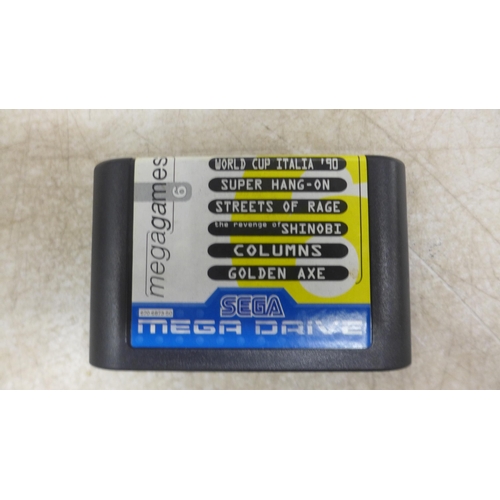 5080 - A Sega Mega Drive II 16-bit games console with a six game Mega Games cartridge including World Cup I... 