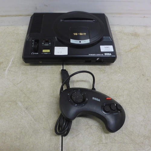 5081 - A Sega Mega Drive 16-bit games console with one Sega controller