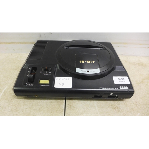 5081 - A Sega Mega Drive 16-bit games console with one Sega controller